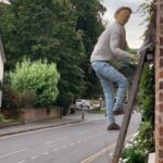Alan Twitchmarsh Trims Wisteria
